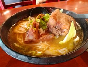 Noodle Soup with Meat and Cabbage in Golden Broth